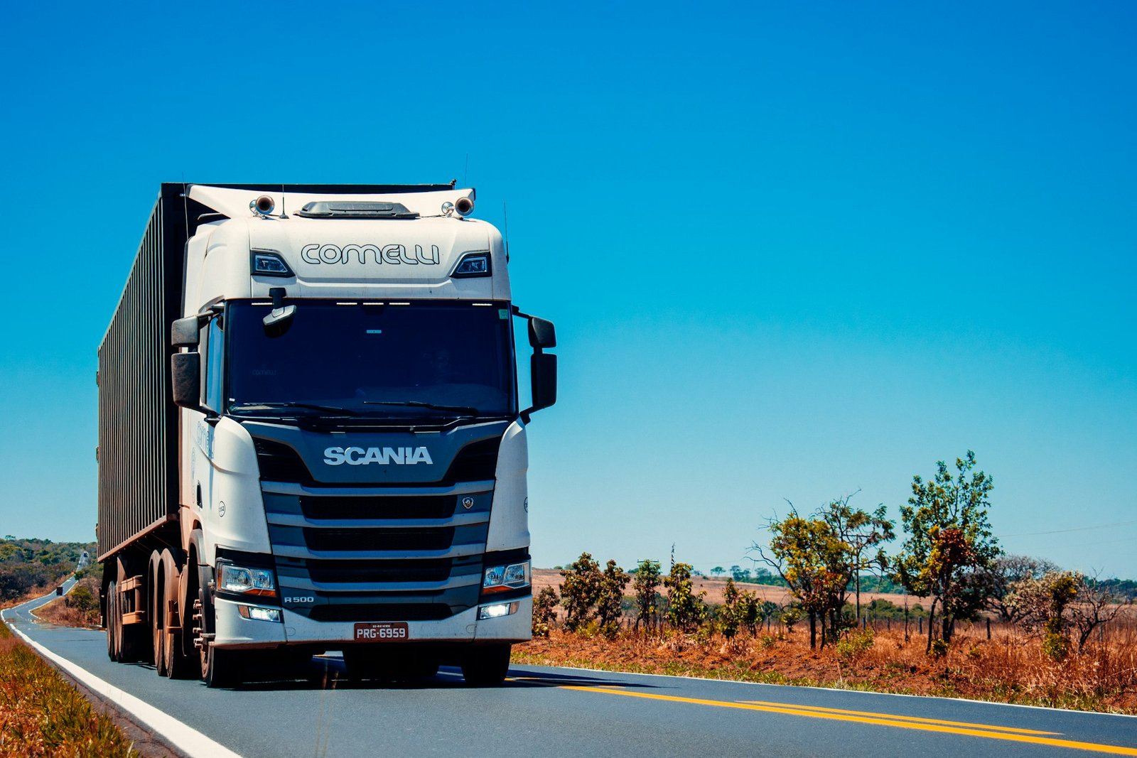 Modern commercial semi-truck hauling freight on highway
